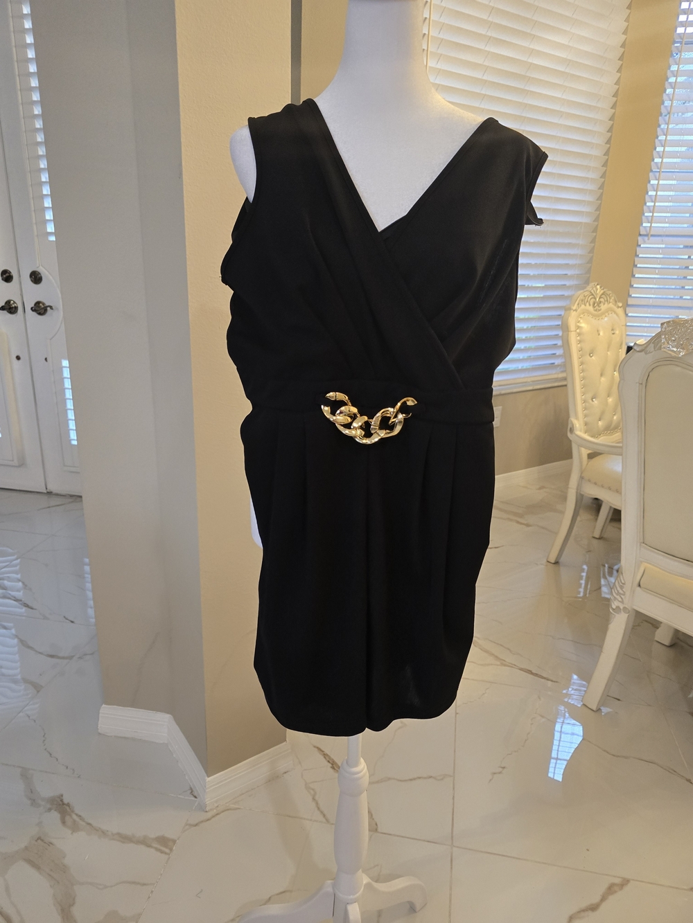 Black Sleeveless Mini Dress with Gold Chain Accent